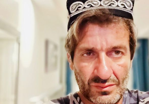 Turkish Journalist Y&uuml;cel Tanay Sentenced to 20 Months in Prison for Criticizing Pro-China Organization Leader